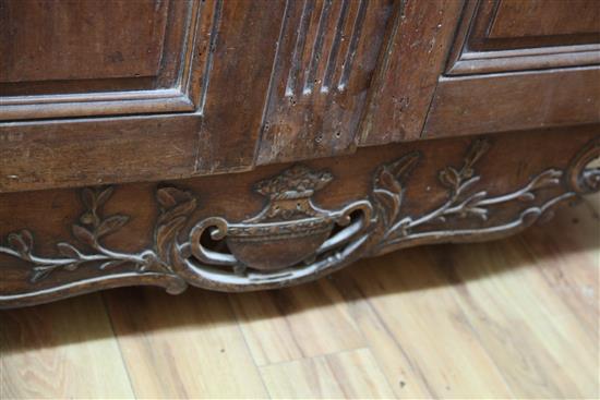 A large 19th century French walnut armoire, H.7ft 9in. W.5ft